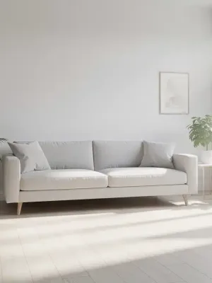 Minimalist living room with natural light and organized space.