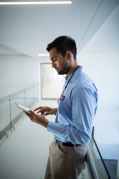 A doctor in a modern clinic in Peru uses a tablet to consult with a remote specialist. The scene is well-lit and professional, emphasizing the integration of technology in healthcare.