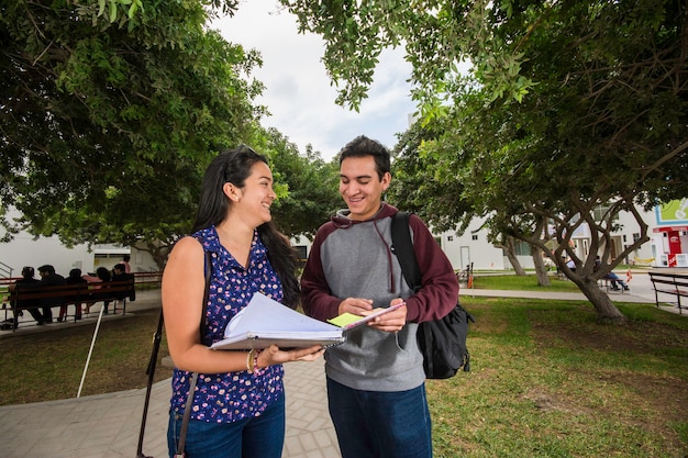 Peruvian students on an American university campus, studying and interacting, representing the F-1 student visa pathway