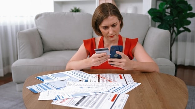 A person looking stressed while surrounded by bills and credit card statements.