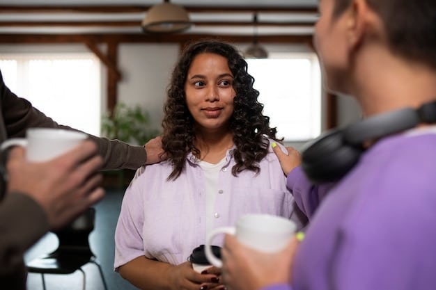 A Peruvian immigrant confidently networking at a professional event in the United States, exchanging business cards and engaging in conversation with diverse professionals.