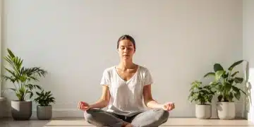 Person meditating peacefully in a bright, minimalist room, embodying mindful living.